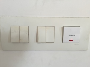 Light switches in my room; the one on the right is for the water heater